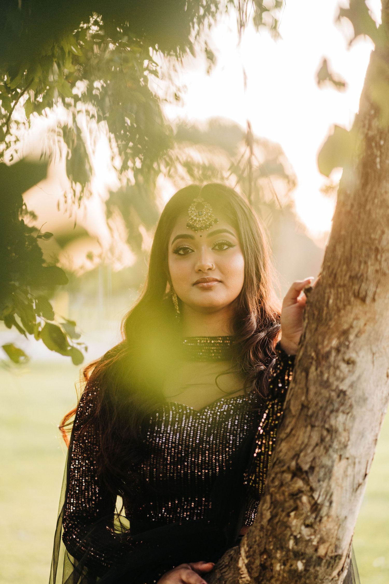 Portrait of a guest in golden light at a 21st birthday party