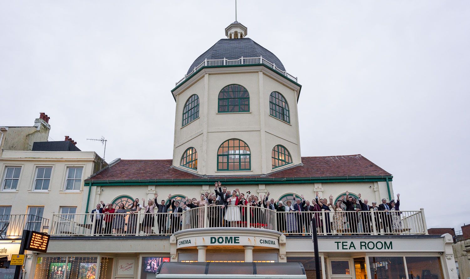 Historic tea room pavilion with octagonal tower and balcony overlooking beachfront in Broadstairs, England.