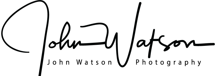 John Watson Photography logo featuring an elegant handwritten signature in black ink on a white background.