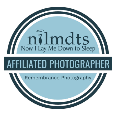 Circular badge reading Now I Lay Me Down to Sleep, nilmdts, Affiliated Photographer, Remembrance Photography, in blue and navy.