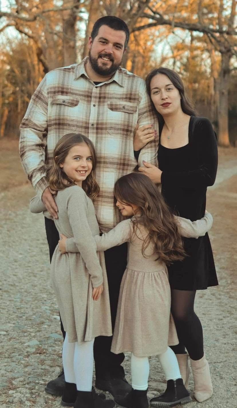 Family portrait series in coordinated neutral outfits during golden autumn light.