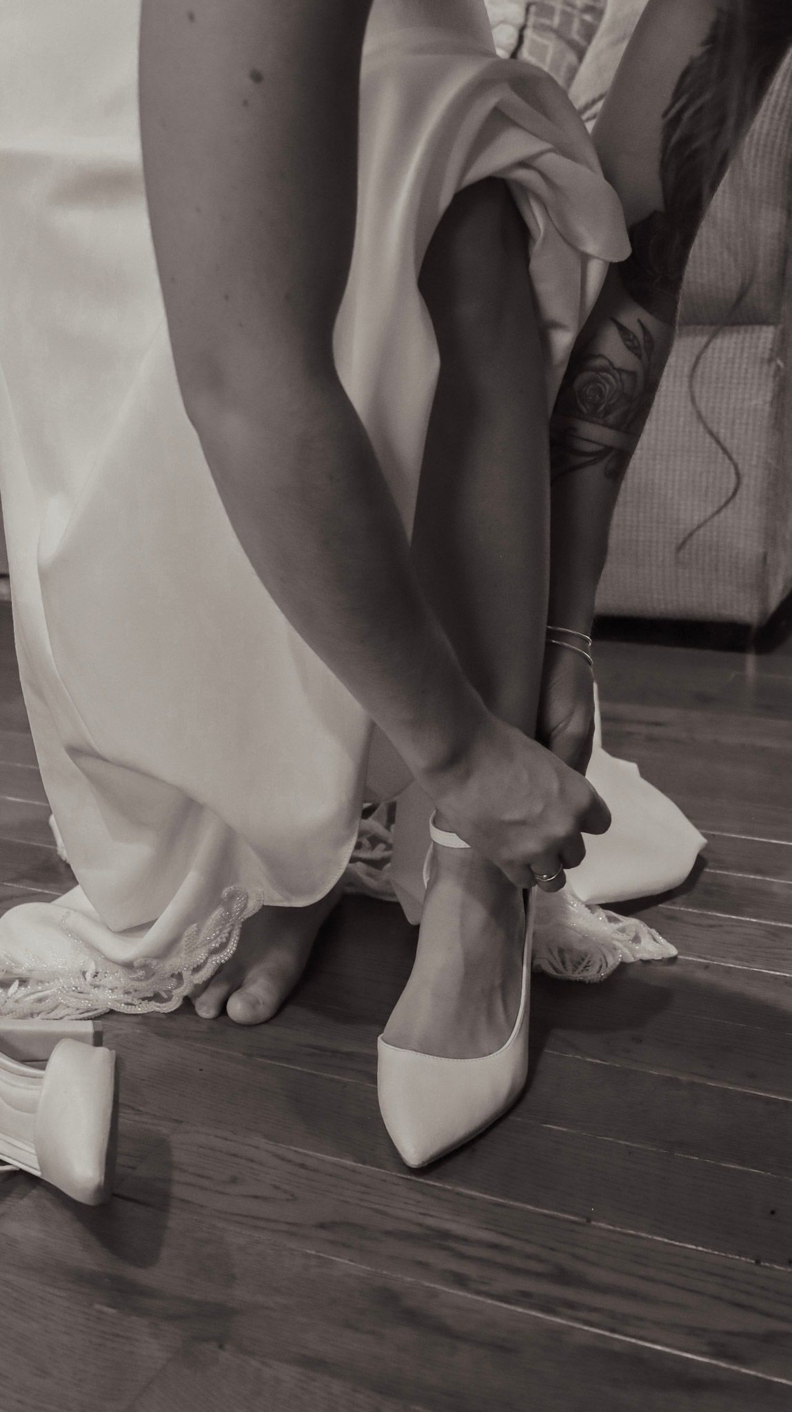 Black and white photo series showing feet in ballet flats on a wooden floor.