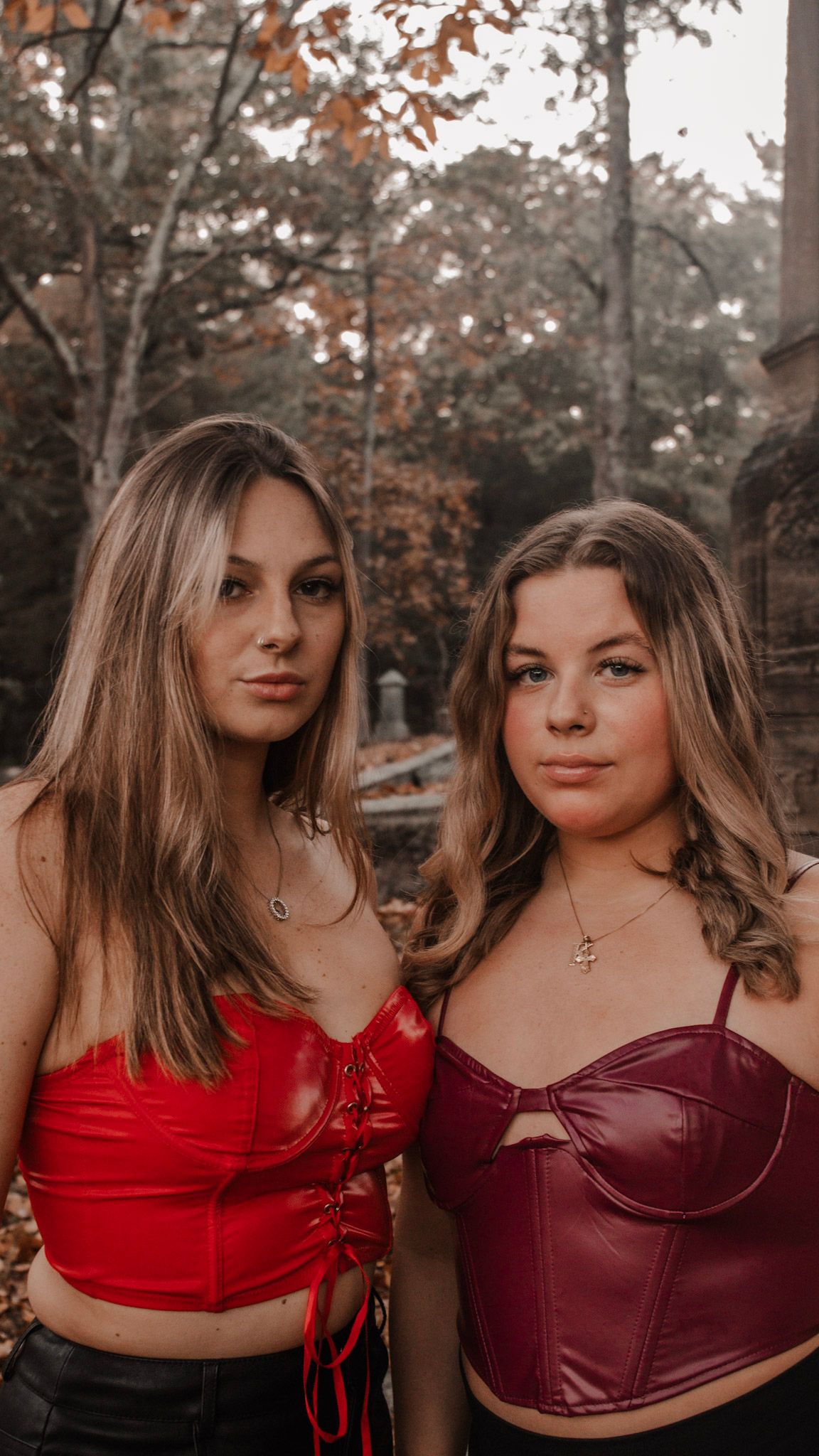 Series of photos showing two people posing together outdoors wearing red and burgundy tops against an autumn backdrop.