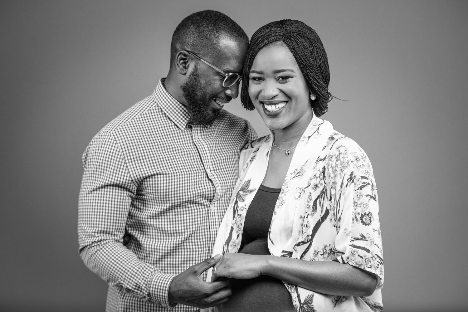 Studio portraits showing joyful interactions and laughter between couples.