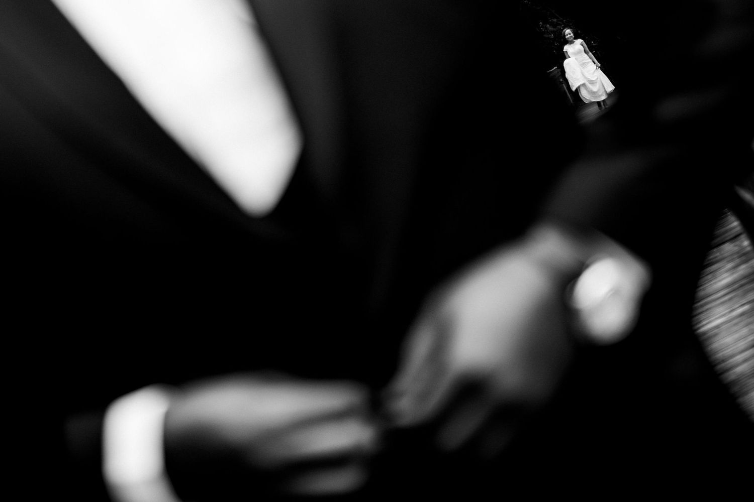 Black and white artistic wedding detail shots with dramatic lighting and shadows.