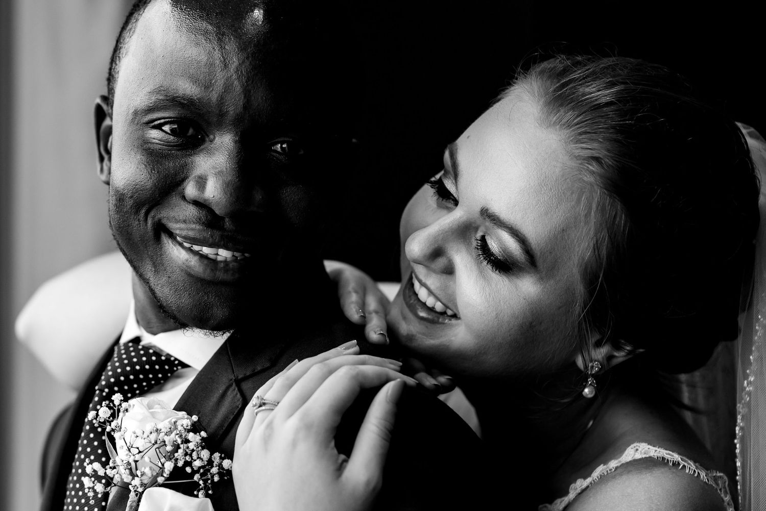 Romantic black and white portraits capturing intimate moments between couples.