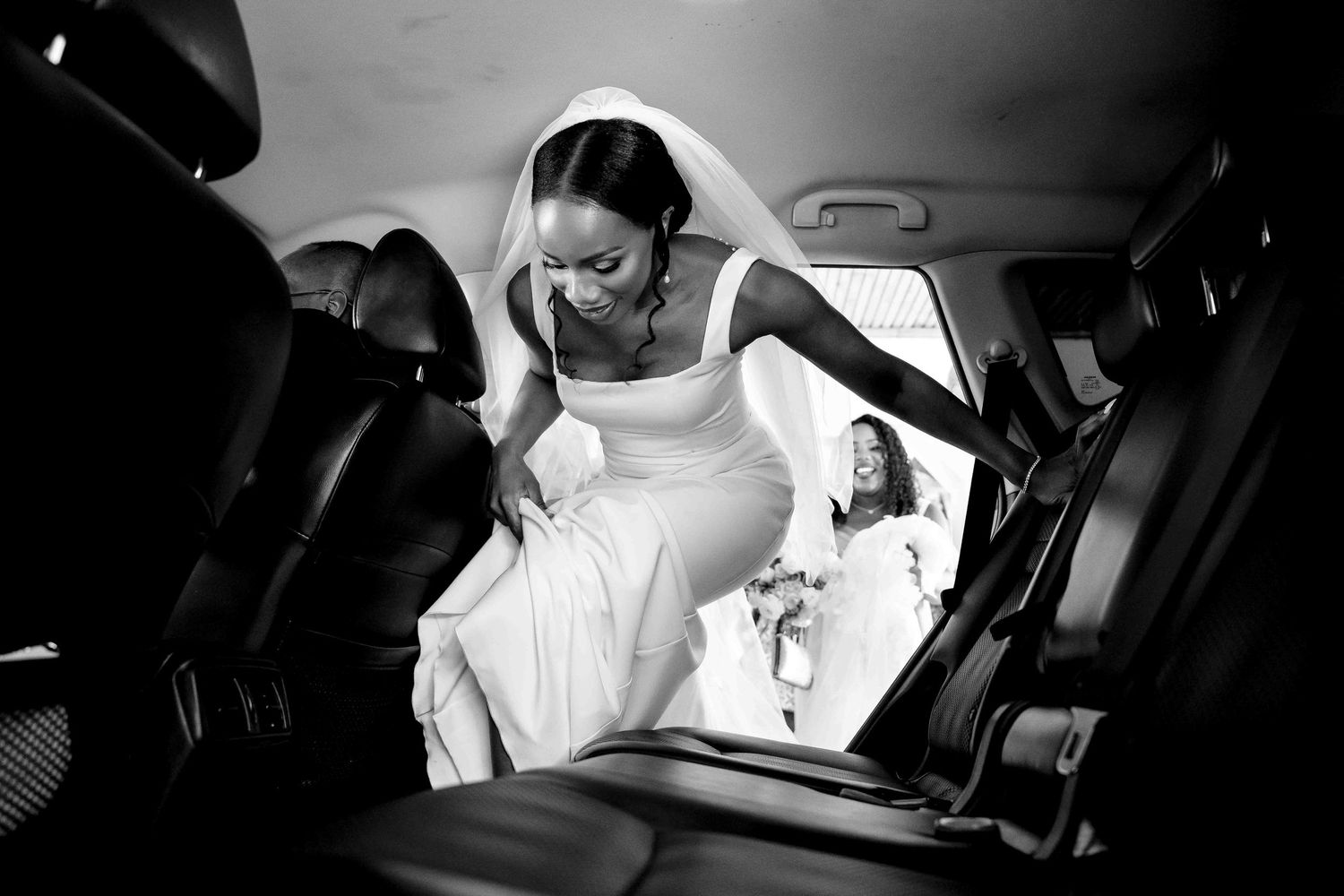 A black and white photo collage showing people in various candid moments inside cars and vehicles.