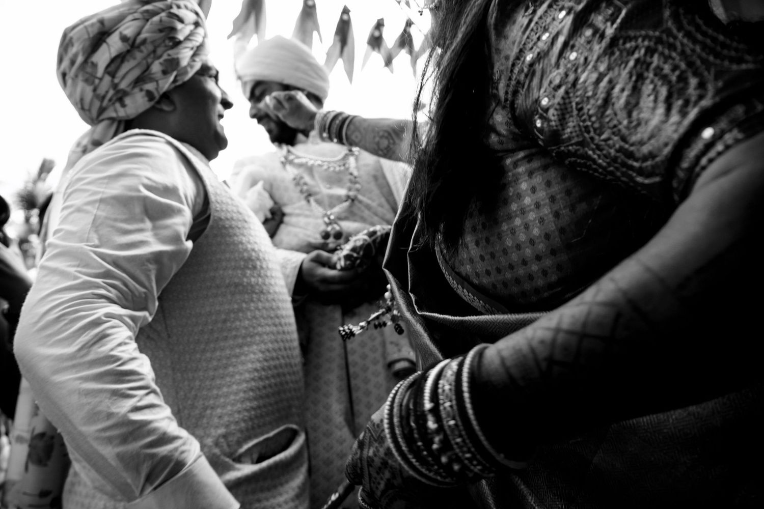 Black and white crowd shot showing people gathered at an outdoor event.