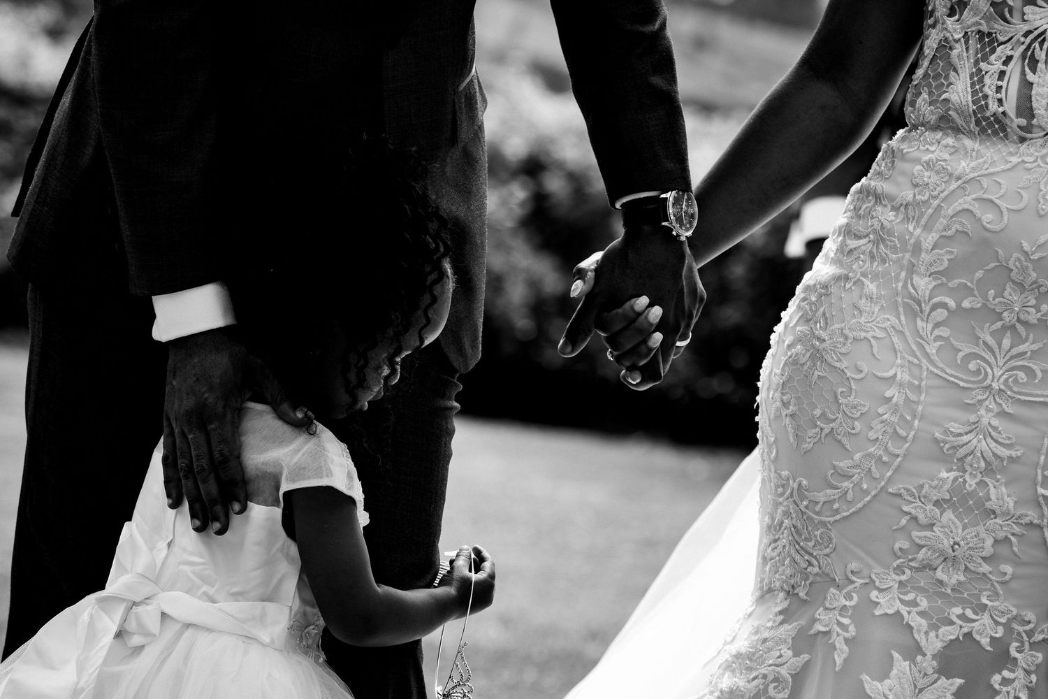 Wedding ceremony details captured in dramatic black and white photography.
