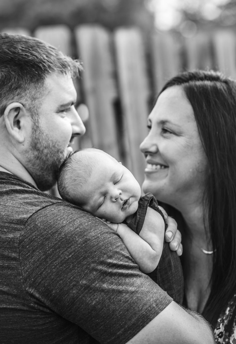 Black and white sequence of tender family moments.
