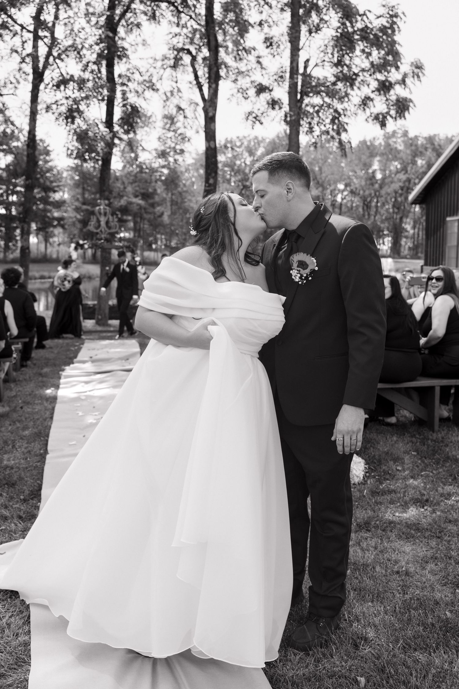 A series of romantic wedding photos showing a couple dancing together outdoors in black and white.  wedding, lifestyle, cinematic,