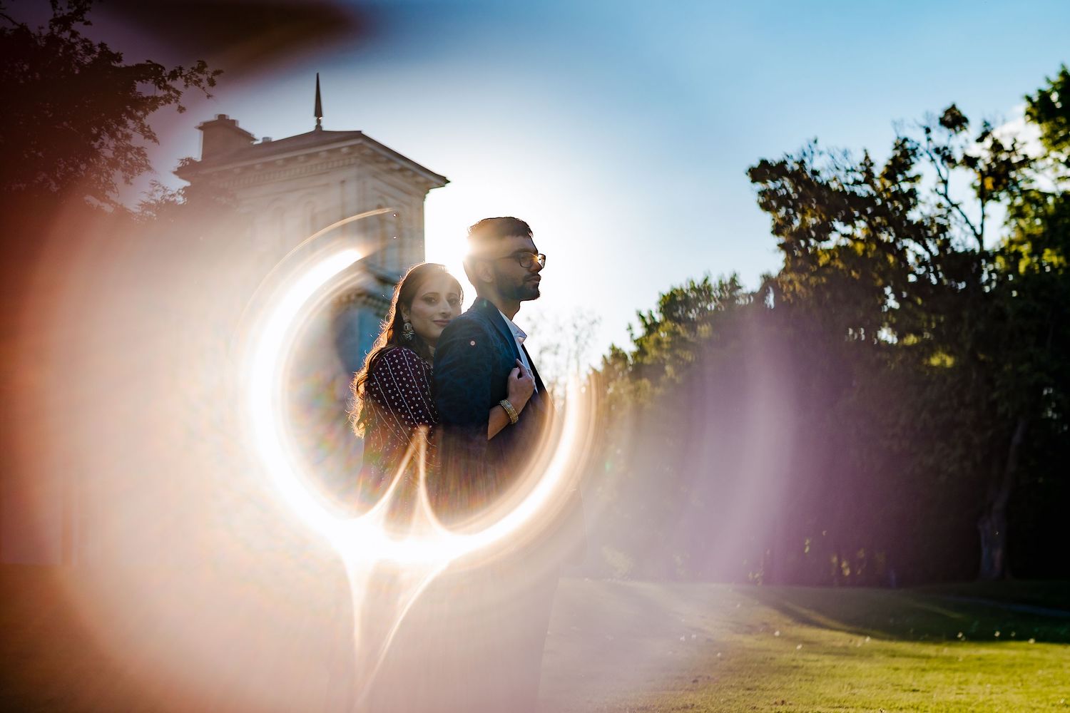 Series of romantic backlit silhouettes against a bright sun creating a beautiful halo effect.