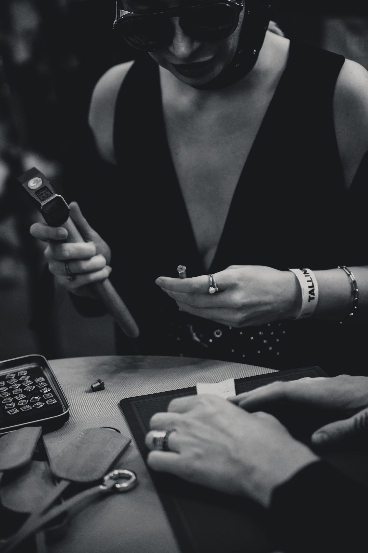 Black and white close-up of hands gesturing during conversation.