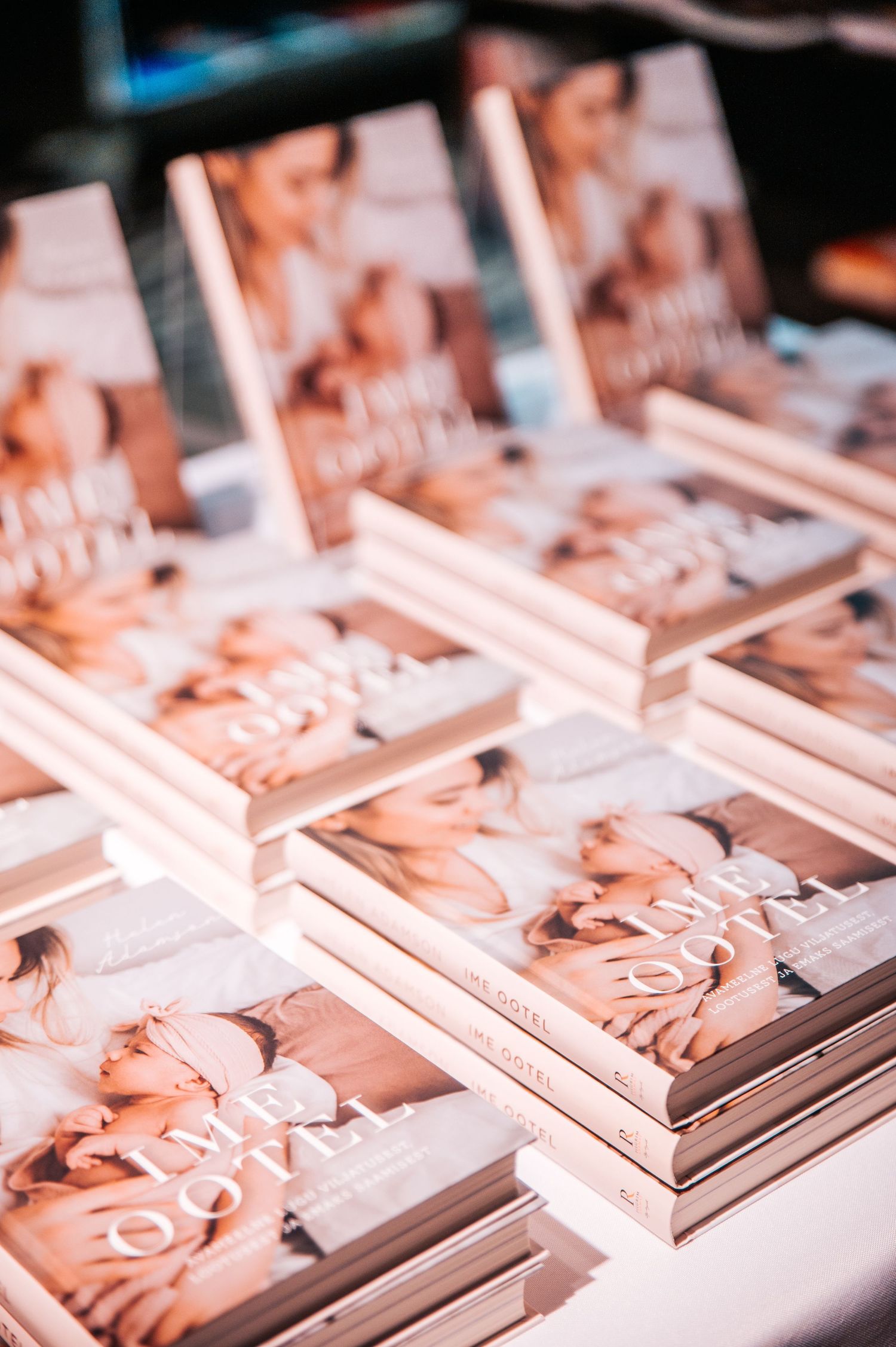 Rows of branded merchandise items arranged neatly on display at an event.