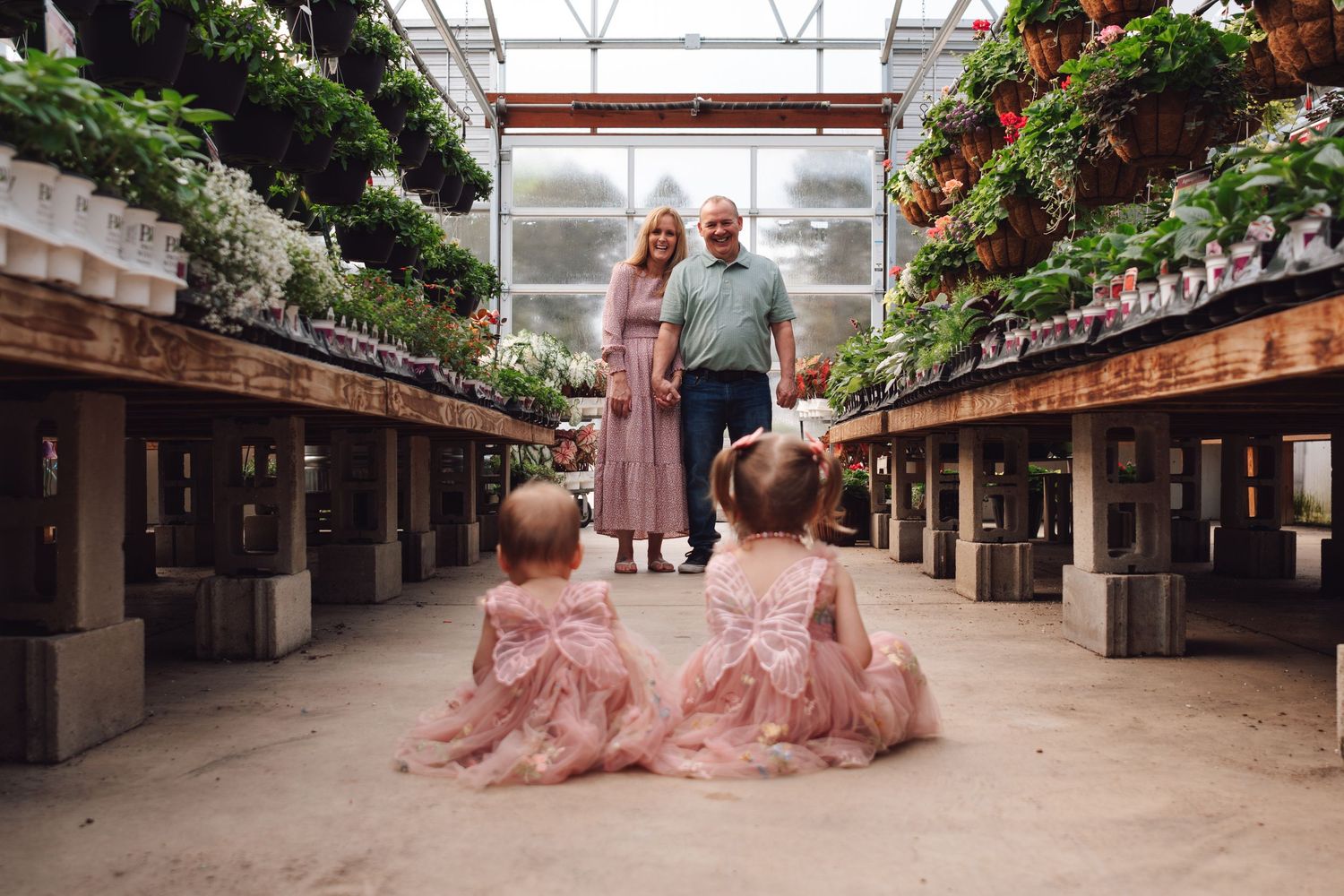 family photos greenhouse session of children grandparents parents