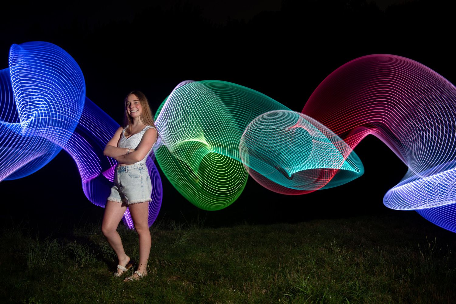 Unique high school senior portraits for girls with night photography and light painting with Leah Ramuglia Photography Boston’s South Shore.