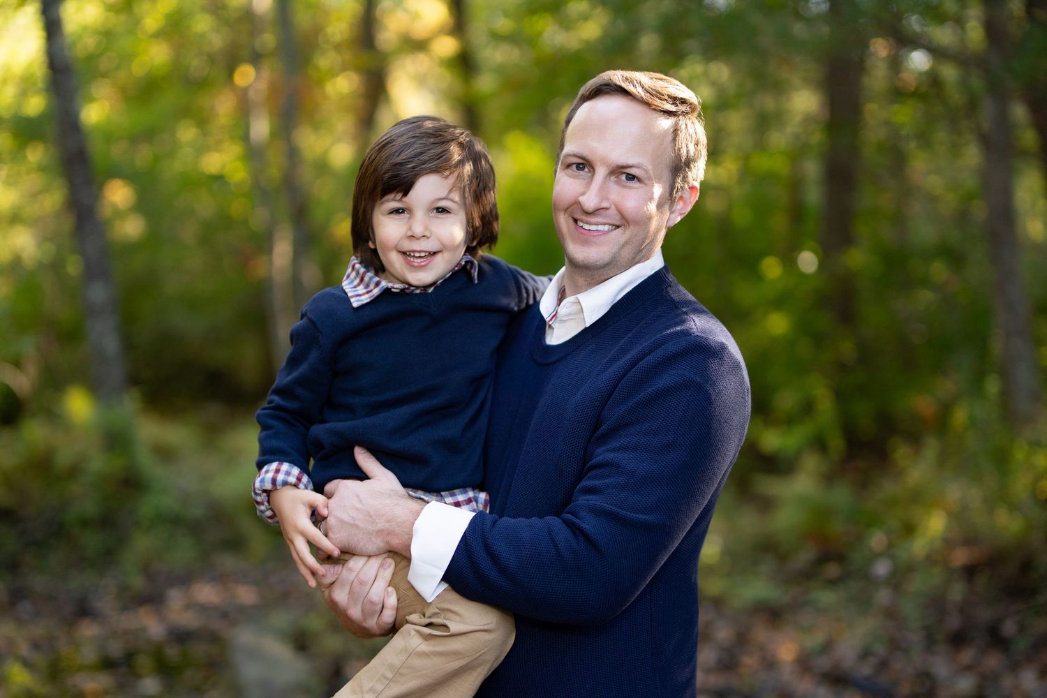Father & son professional family portraits in scenic Norris Reservation in Norwell, MA with Leah Ramuglia Photography.