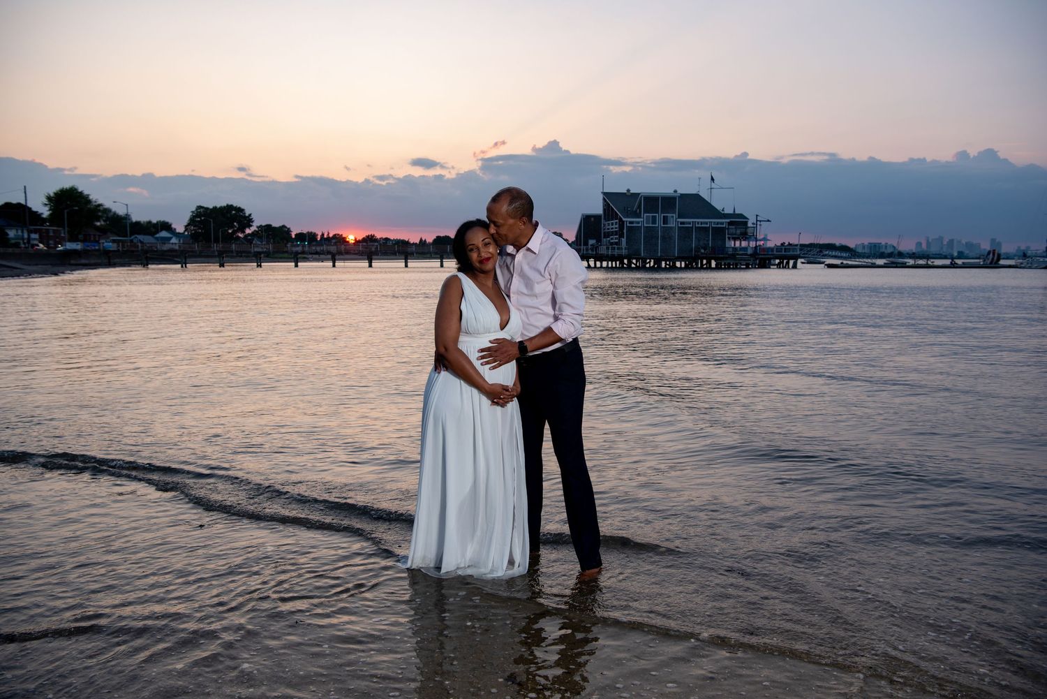 Luxury Family Portraits in Quincy. Vacation & Maternity Photoshoot at sunset on Wollaston beach with Leah Ramuglia Photography.