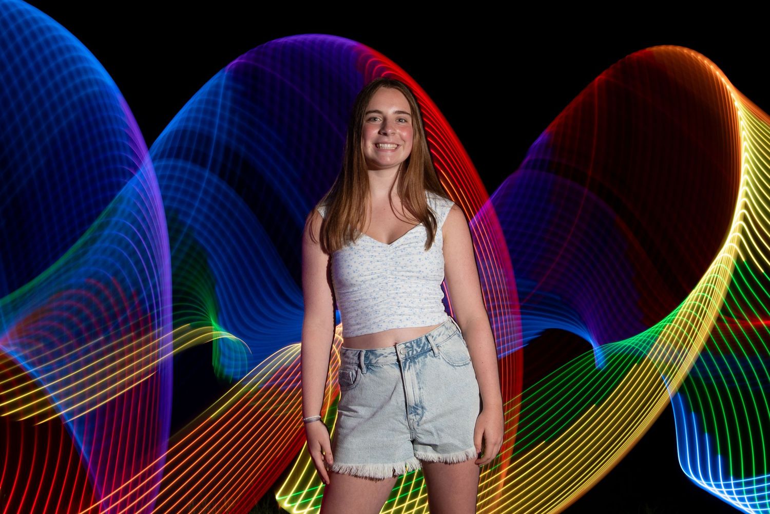 Unique high school senior portraits for girls with night photography and light painting with Leah Ramuglia Photography Boston’s South Shore.