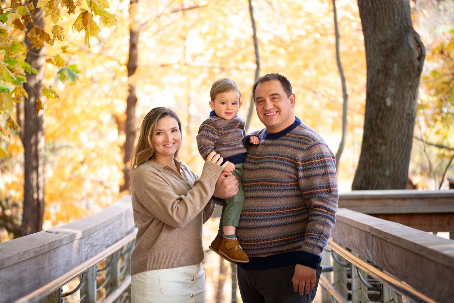 Fall Foliage Family Portraits surrounded by golden autumn leaves in Milton's Blue Hills Reservation with Leah Ramuglia Photography.
