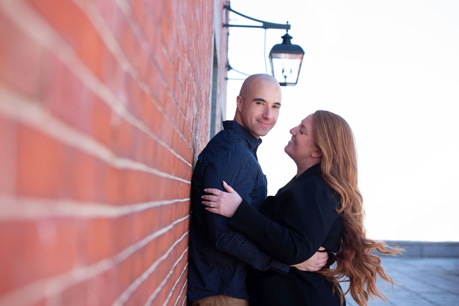 Things to do in Boston. Romantic couples portraits on the brick Freedom Trail. Photoshoots and by Leah Ramuglia Photography.