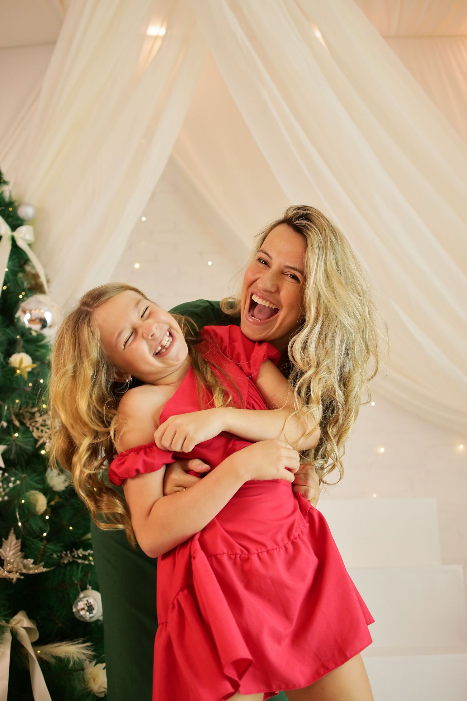 A joyful moment captured in a series of three photos showing playful interaction against a light backdrop with holiday decor.