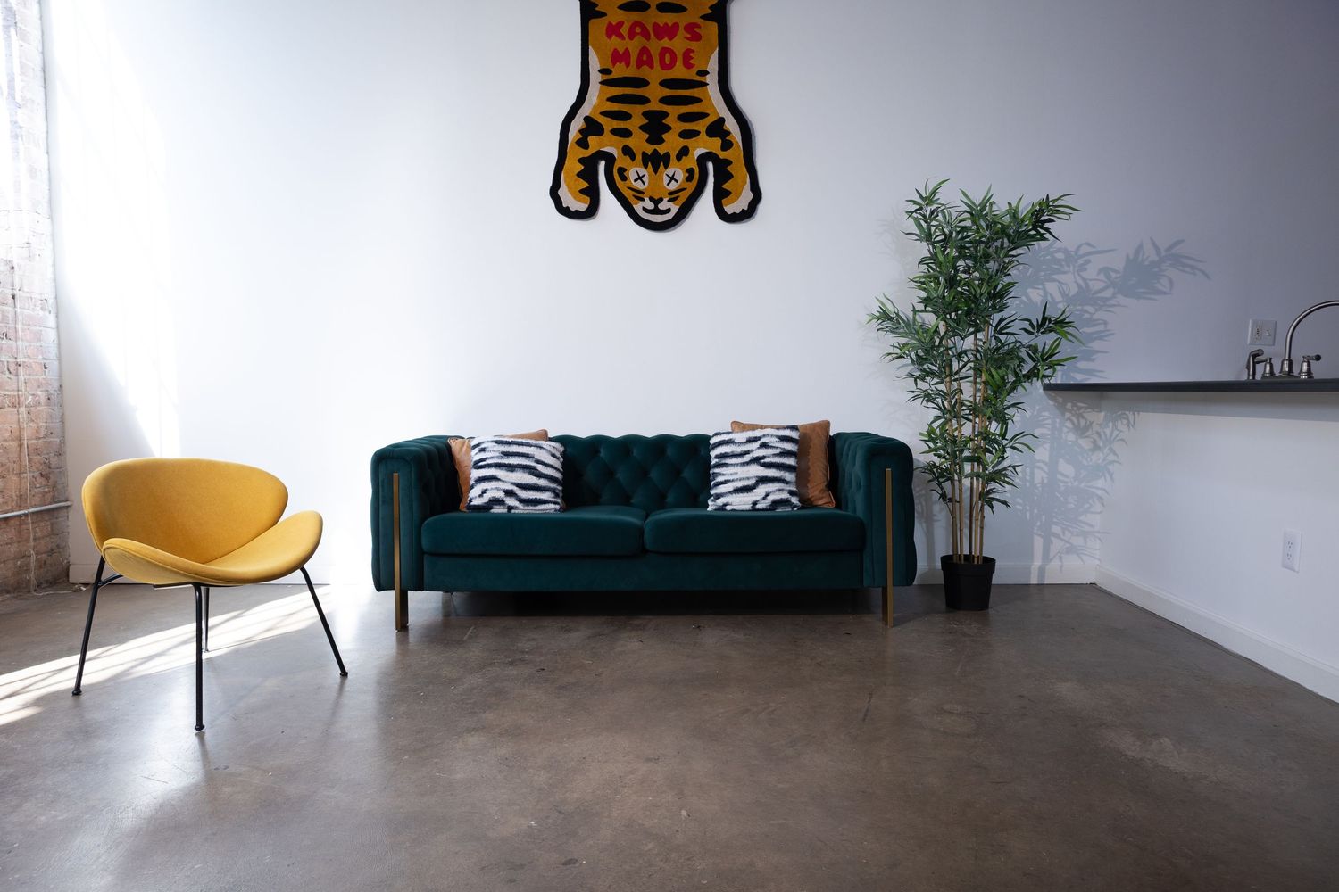 Industrial loft studio with large grid windows and natural light for photography and video shoots