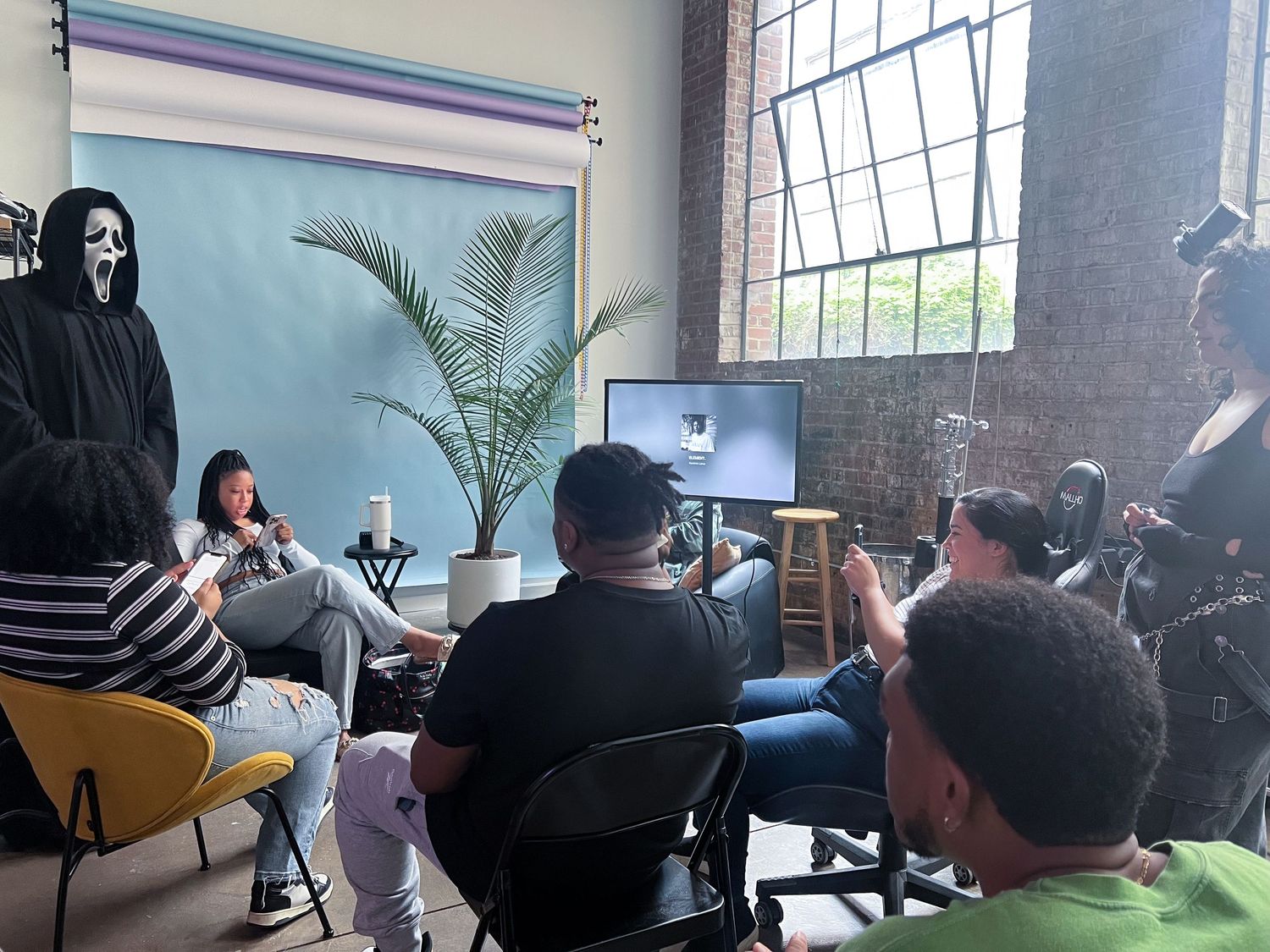 Creative studio rental space with group filming setup for content creation, workshops, and photo shoots