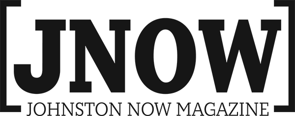 A black and white text logo reading 'JNOW' for Downtown Now Magazine against a dark background.