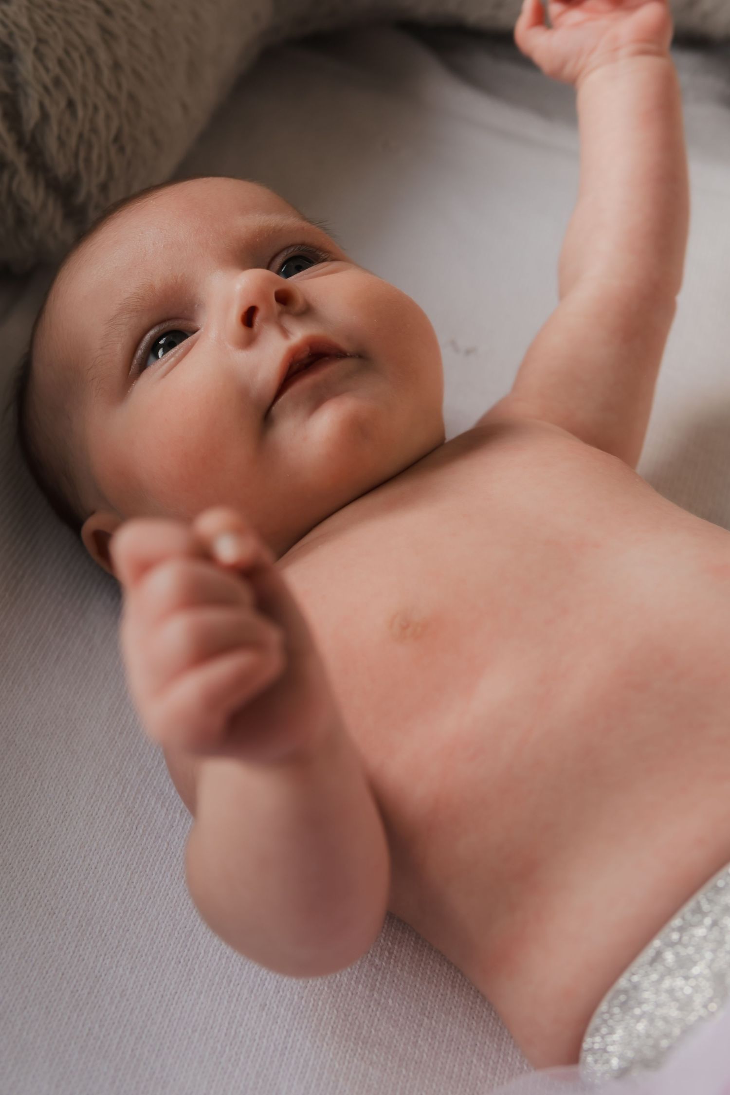Portrait of a newborn baby taken at an in home shoot in Derbyshire by Shots by Maz Photography.
