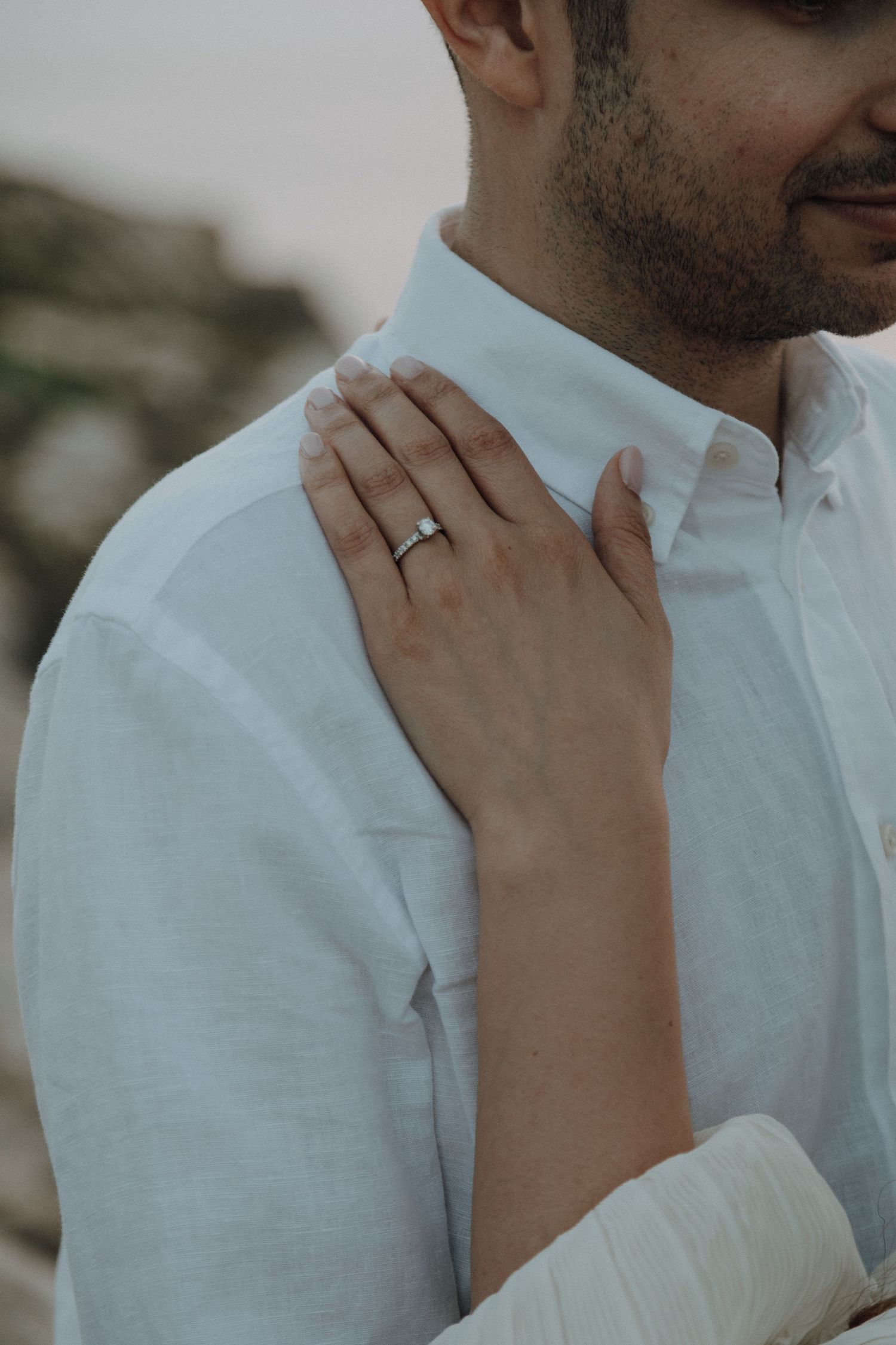 Close up of hands and ring details during an intimate couples photoshoot.