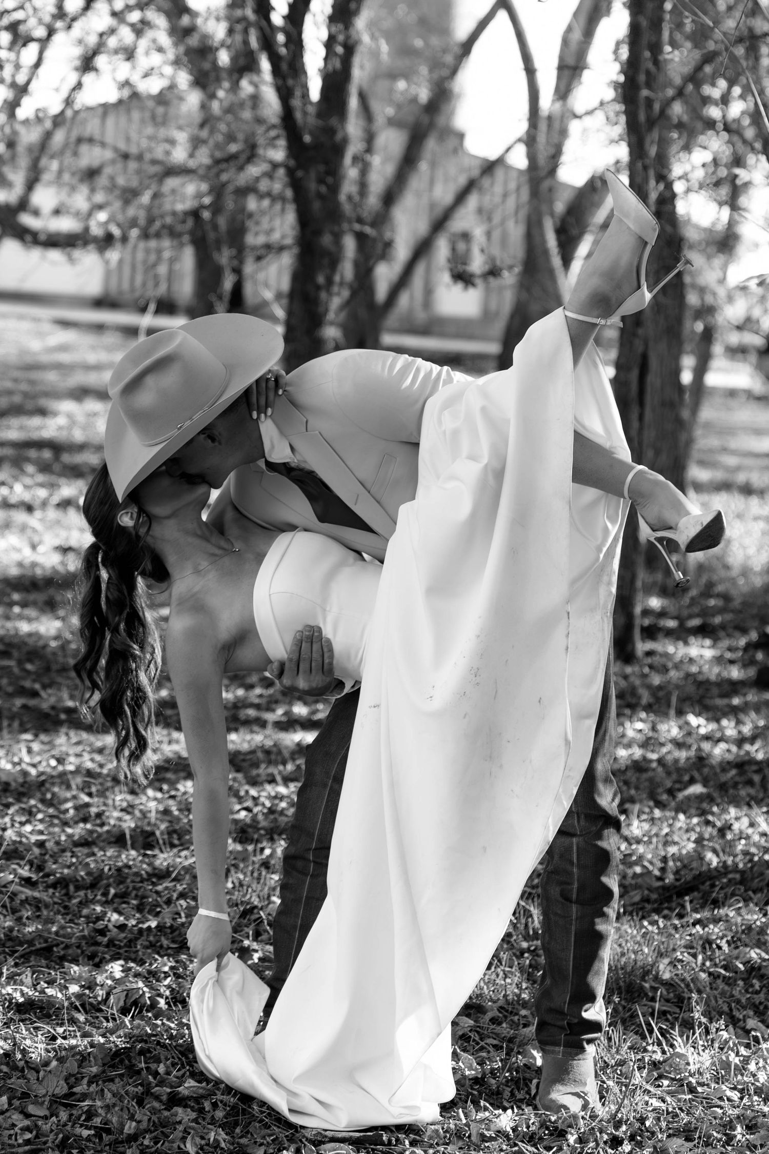 Bride and groom kissing on wedding day