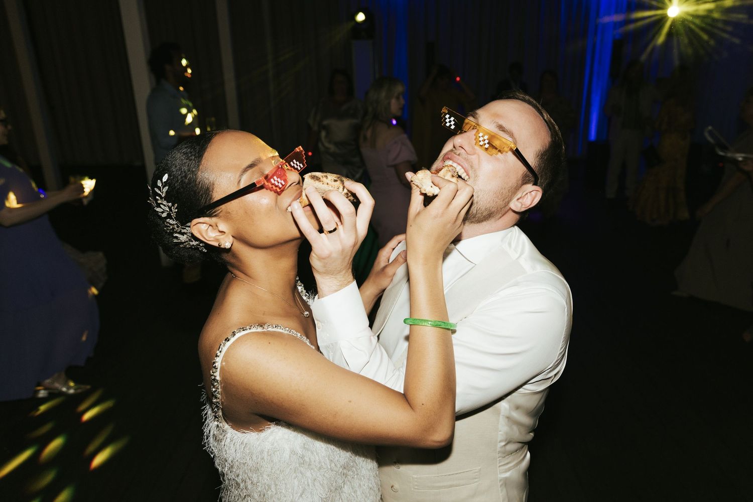 A series of wedding photos showing couples dancing and embracing during a celebration at night.