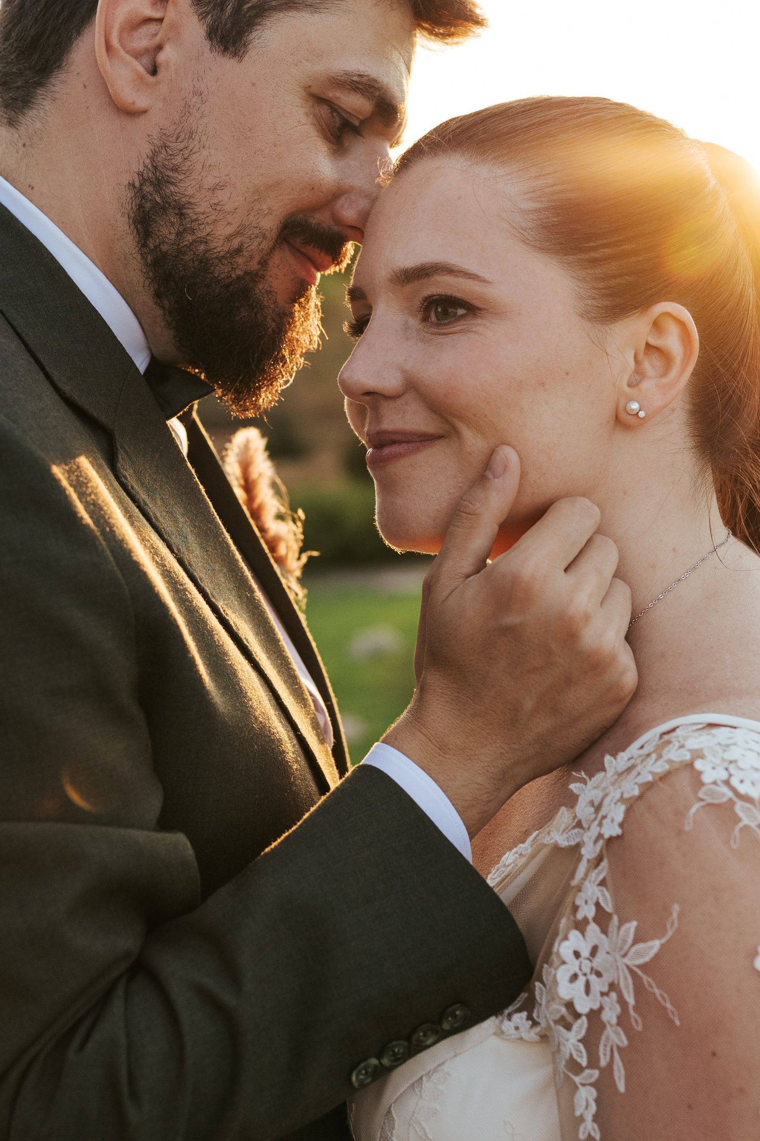 A romantic sunset wedding portrait series showing tender moments between a couple in formal attire.