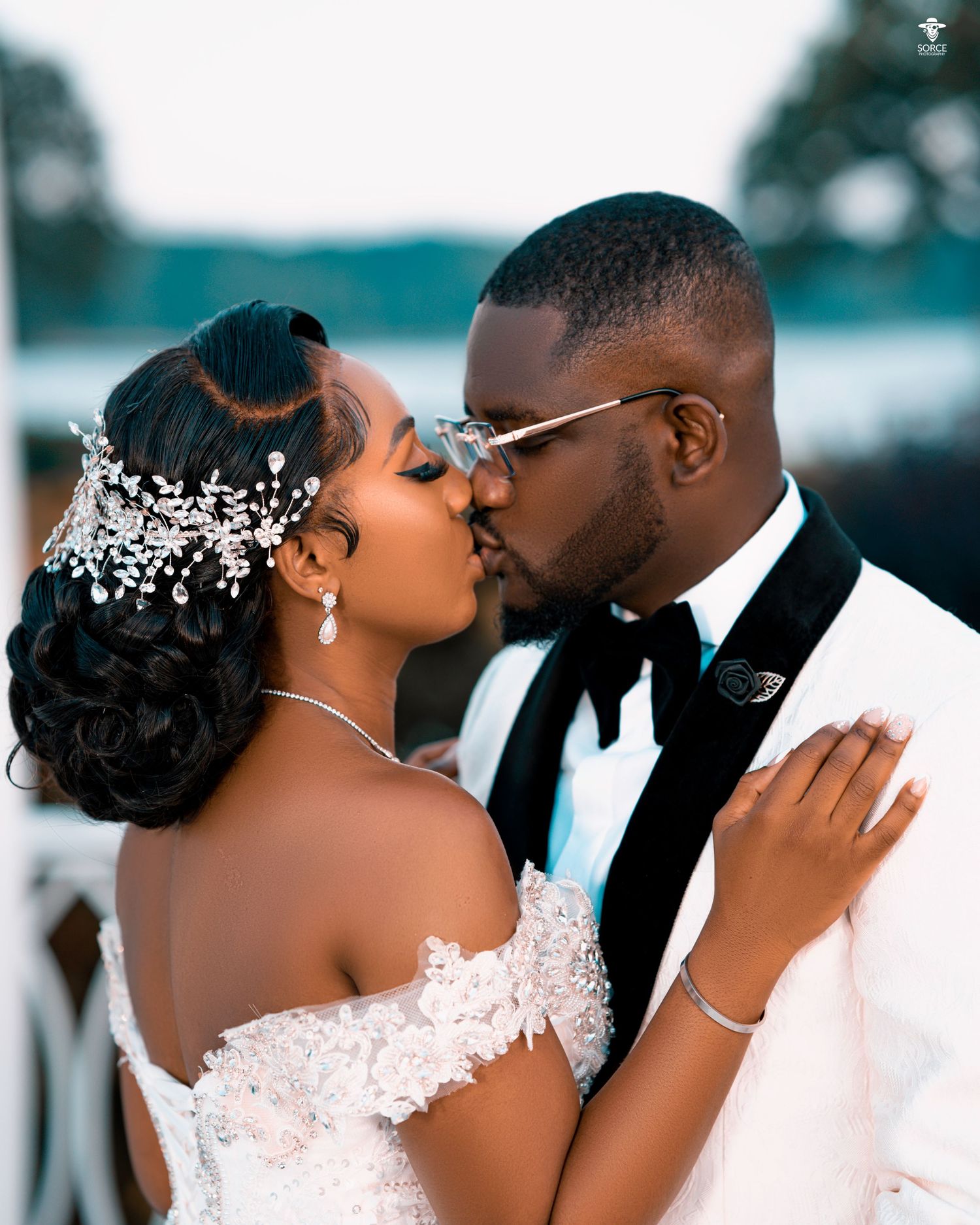 Romantic wedding portrait captured outdoors with elegant styling and soft lighting.
