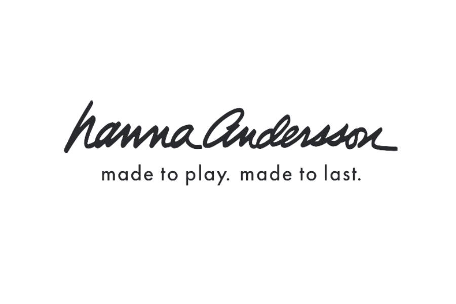 Handwritten Hanna Andersson brand logo in black with company tagline underneath.