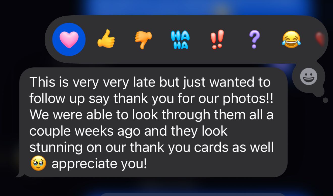 A dark message interface showing a thank you note with reaction emoji buttons visible at the top of the screen.