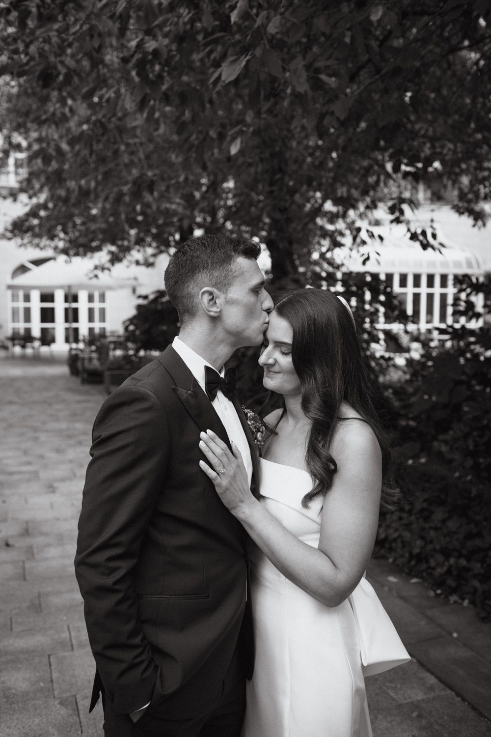 Romantic wedding portrait of a couple outside a church in Ireland