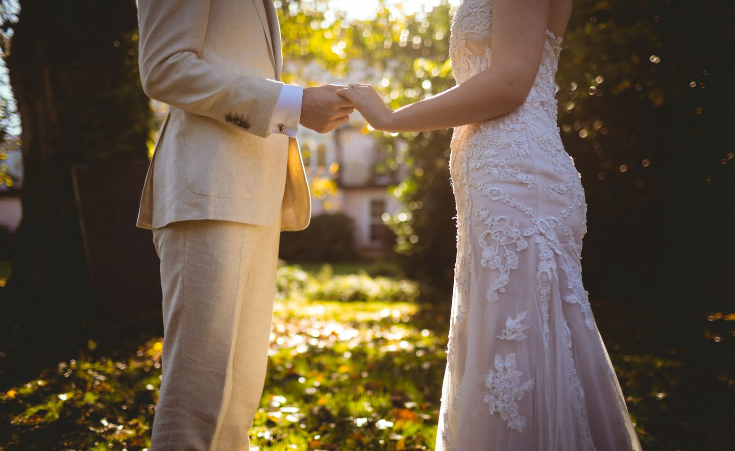 wedding Couple facing each other at during their wedding in Kinsale, Cork, by photographer Paul Cowhig