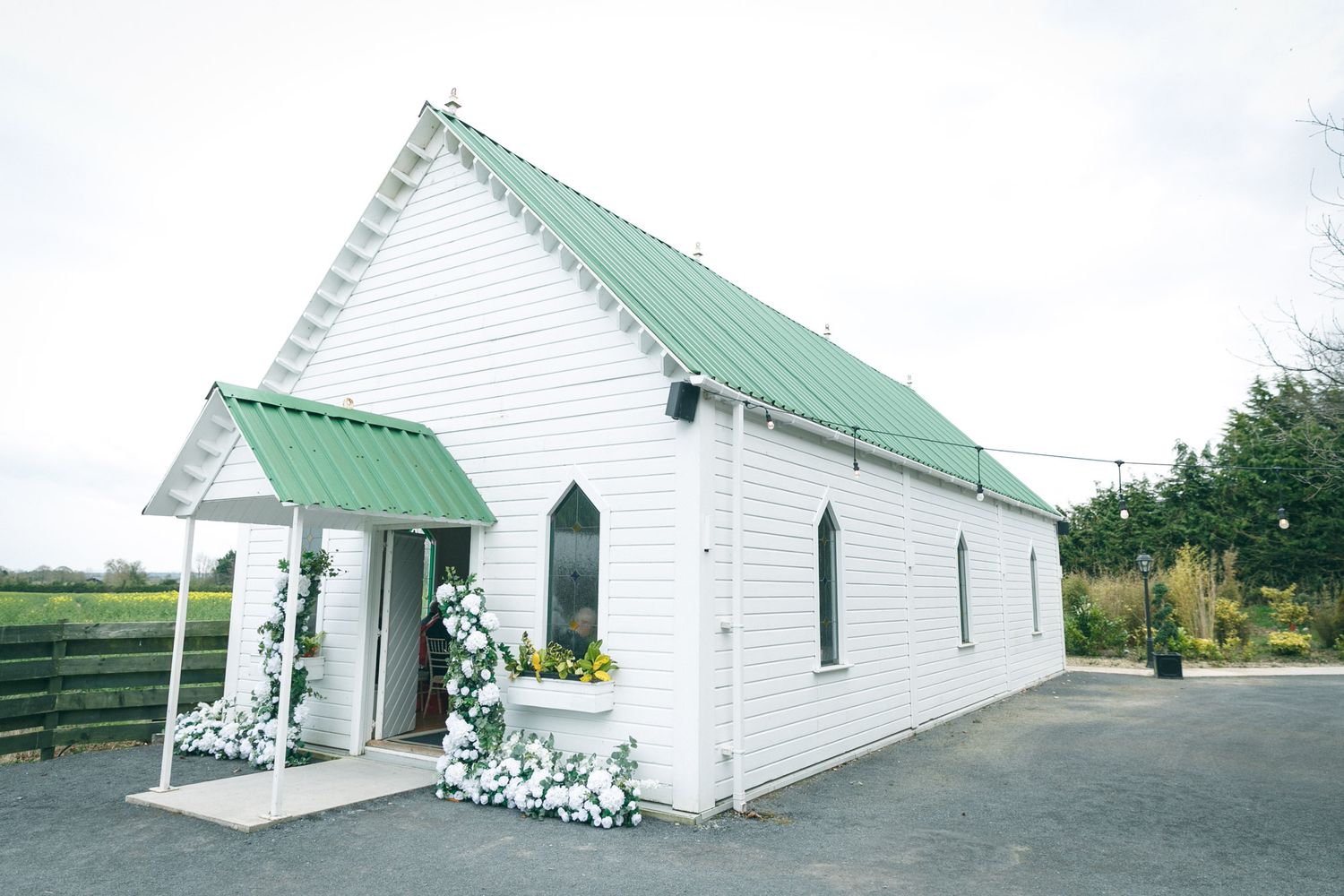 Exterior image of wedding chapel at Clanard Court in Kildare, Ireland captured by wedding photographer Paul Cowhig
