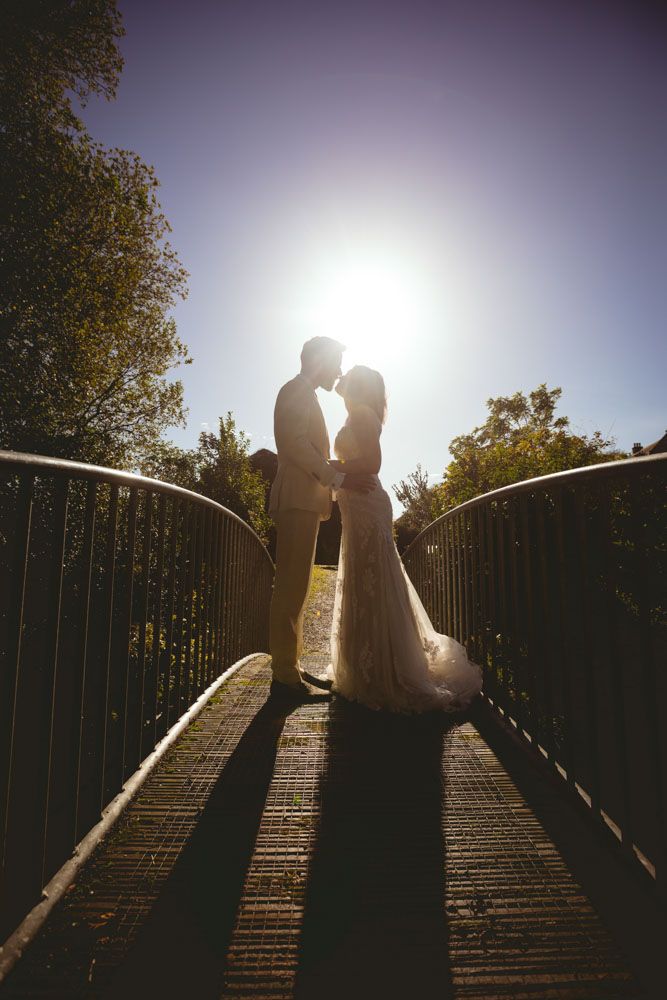 Romantic sunset wedding photo of newlyweds at Ballymaloe house, cork