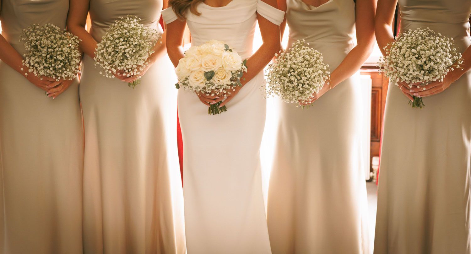 Close up of Bridal party holding bouquet flowers at Kinsale wedding
