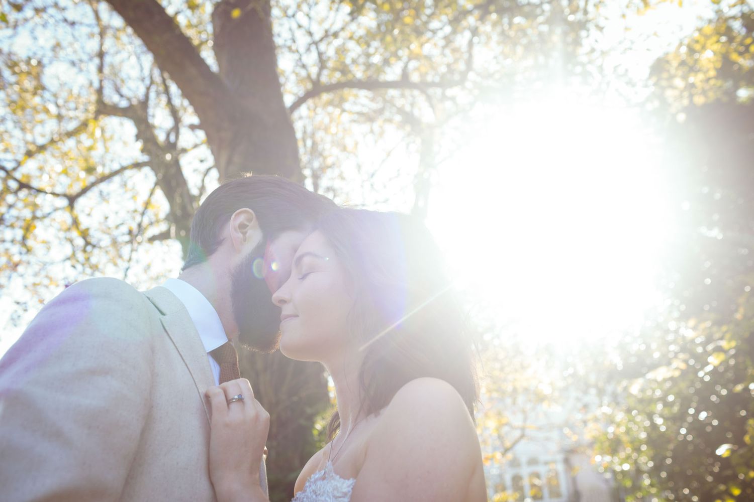 Couple Sharing a kiss during their Cork wedding day in Kinsale, Ireland