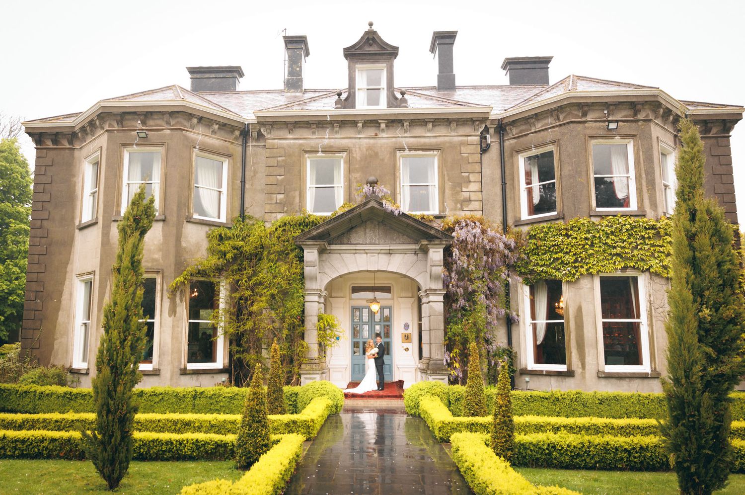 Bride and groom portrait out side the tinakilly country house in Wicklow, Ireland