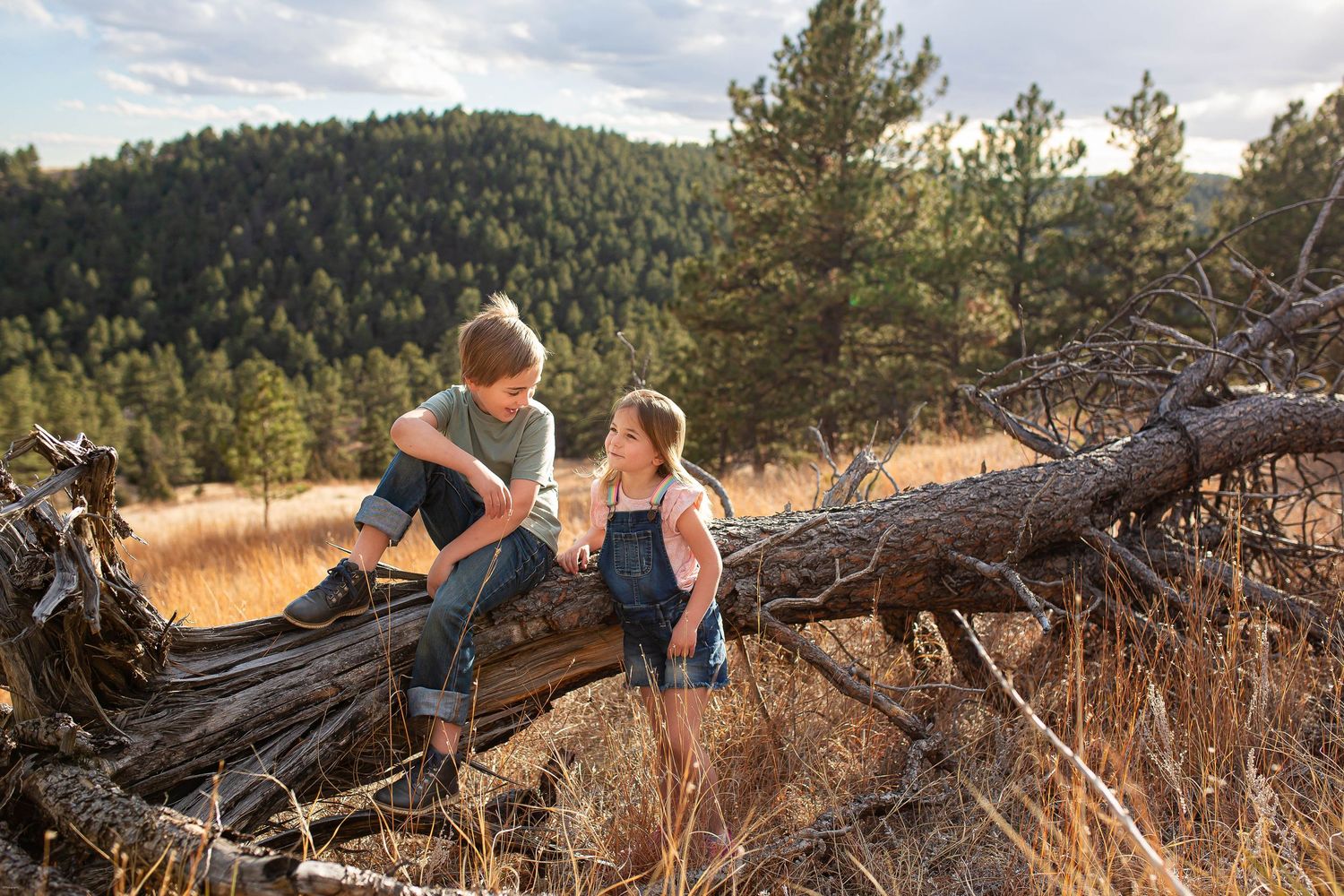 Two kids on their ranch they call home in the black hills of south dakota.