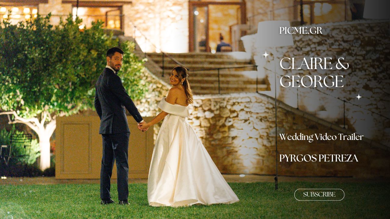 Bride and groom share a romantic moment at sunset with autumn trees and a golden-lit estate venue in the background.