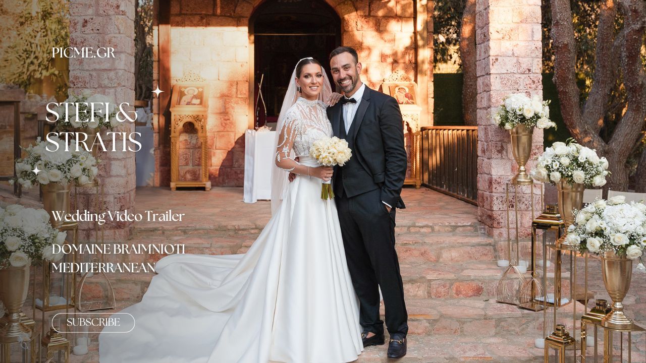 Rustic brick archways line an outdoor courtyard during an elegant evening wedding reception with warm lighting accents.