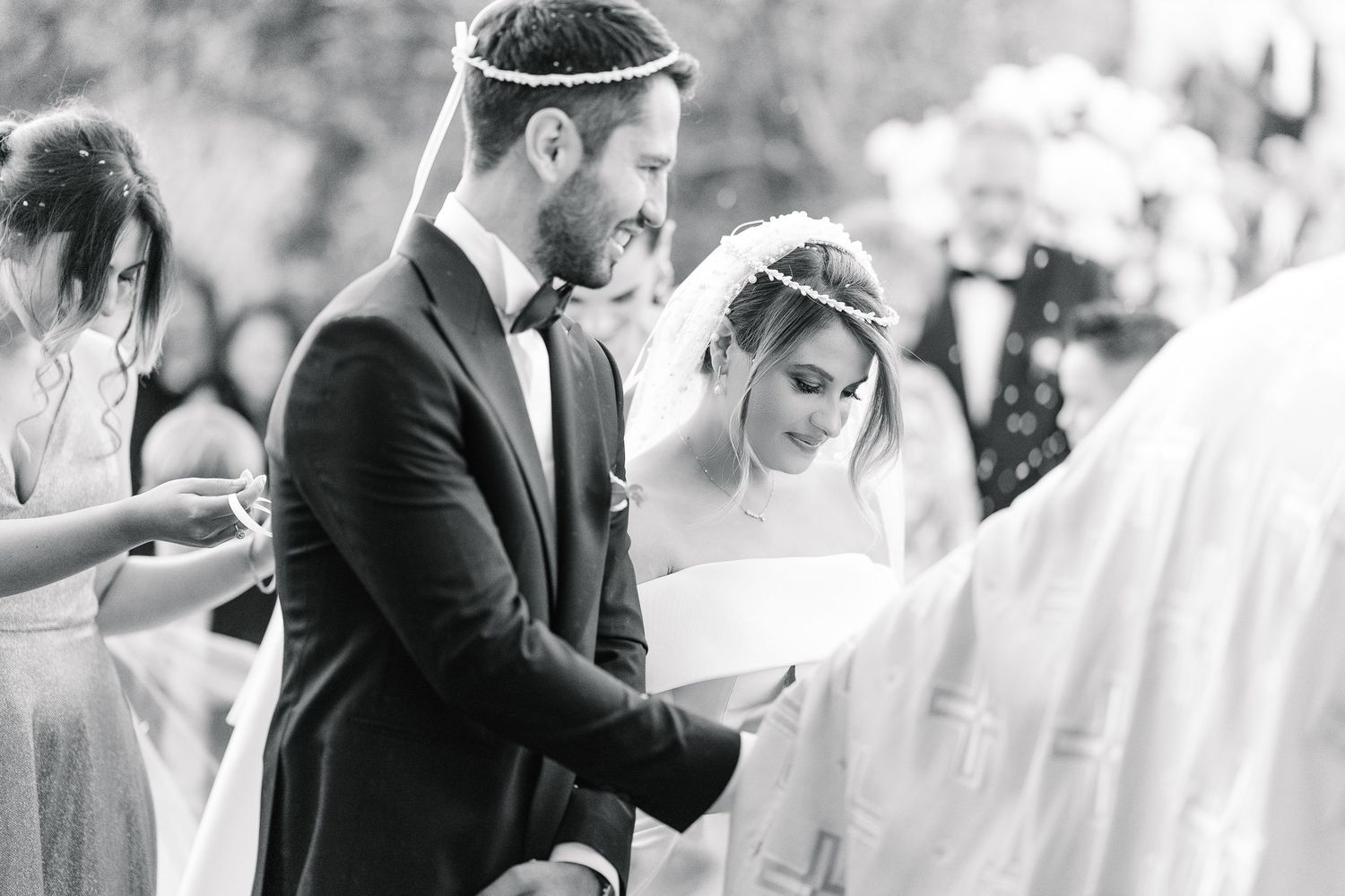 Jewish wedding ceremony moment captured in black and white photography.