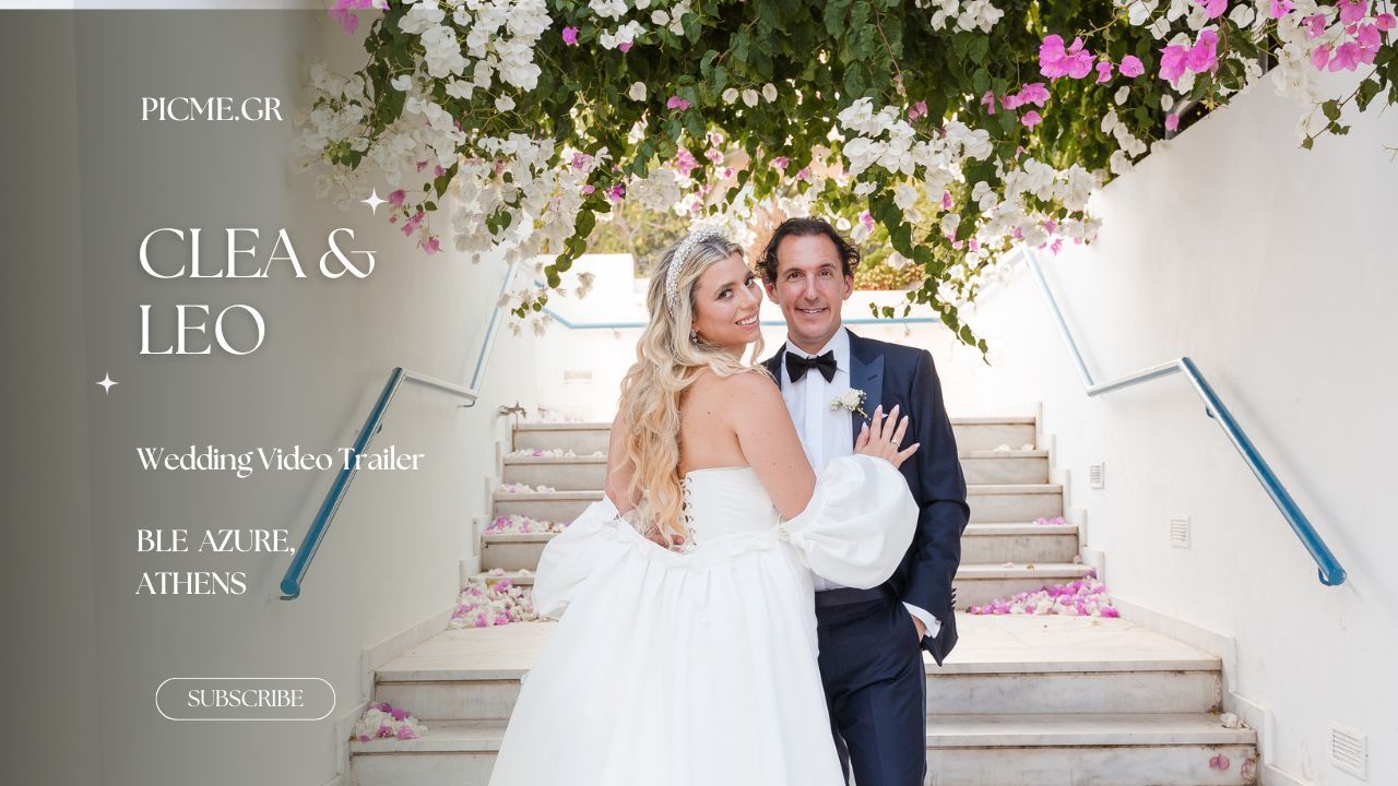 A wedding couple shares intimate moments while posing together amid an elegant white staircase and outdoor setting.