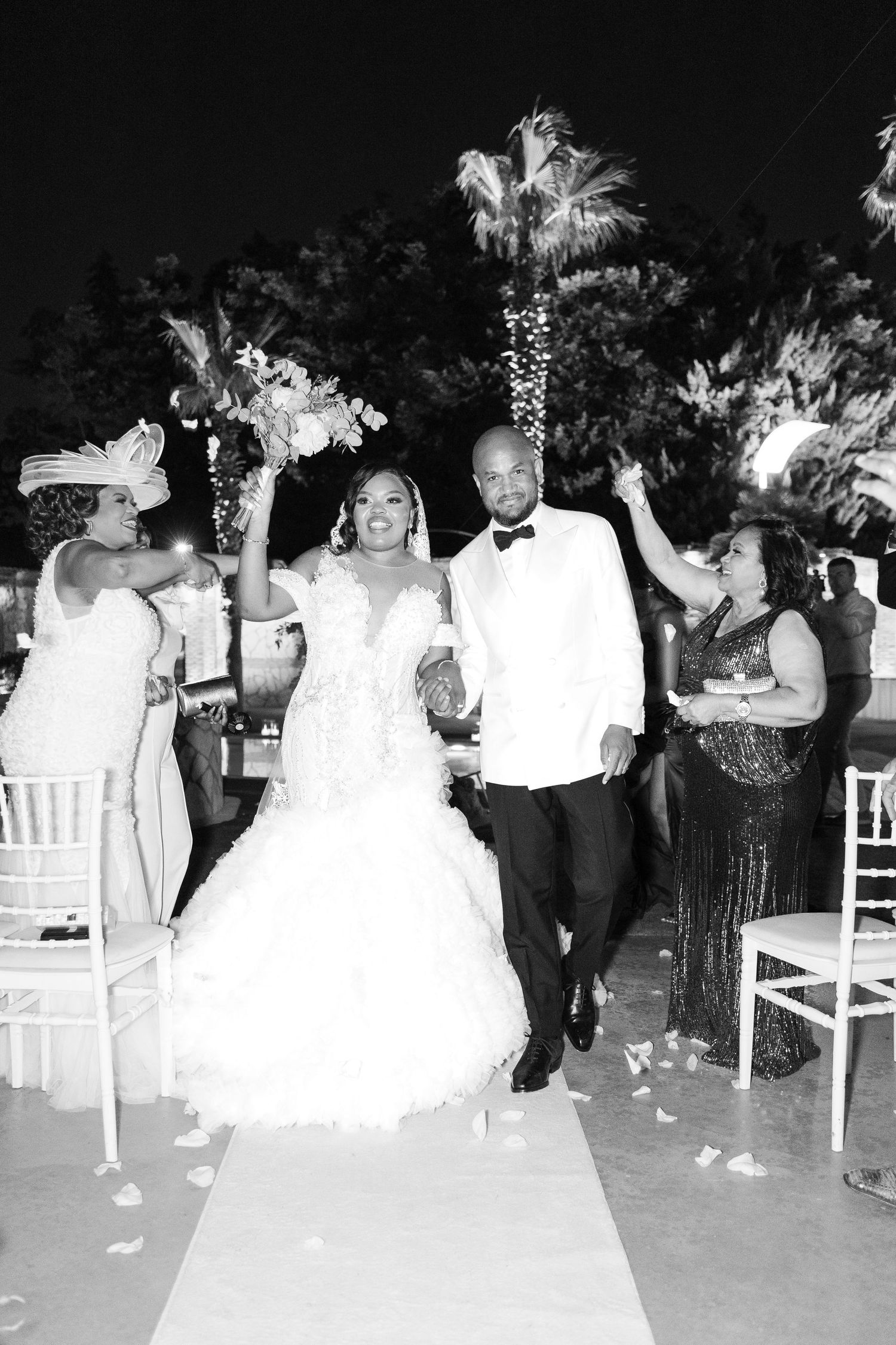 Black and white wedding reception photos showing guests dancing and celebrating.